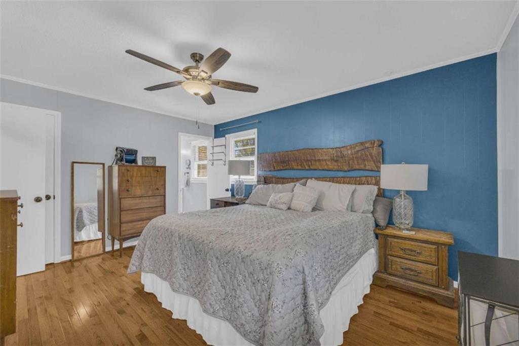 97 Williams Street Toccoa, GA 30577 - Photo 28 of 55 a bedroom with a bed and wooden floor