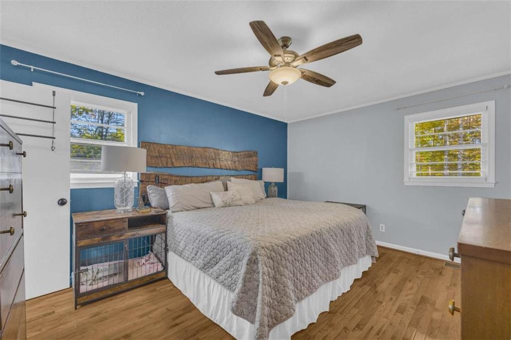 97 Williams Street Toccoa, GA 30577 - Photo 29 of 55 a bedroom with a large bed and a window