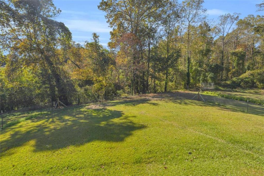 97 Williams Street Toccoa, GA 30577 - Photo 34 of 55 a view of a swimming pool with an outdoor space and seating area
