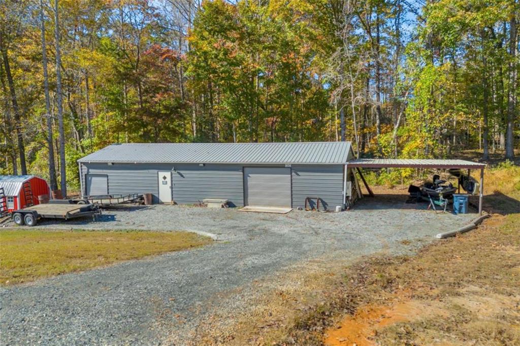 97 Williams Street Toccoa, GA 30577 - Photo 37 of 55 a view of a house with backyard and sitting area