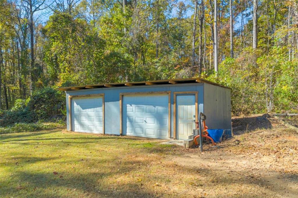 97 Williams Street Toccoa, GA 30577 - Photo 43 of 55 a view of a house with backyard and trees