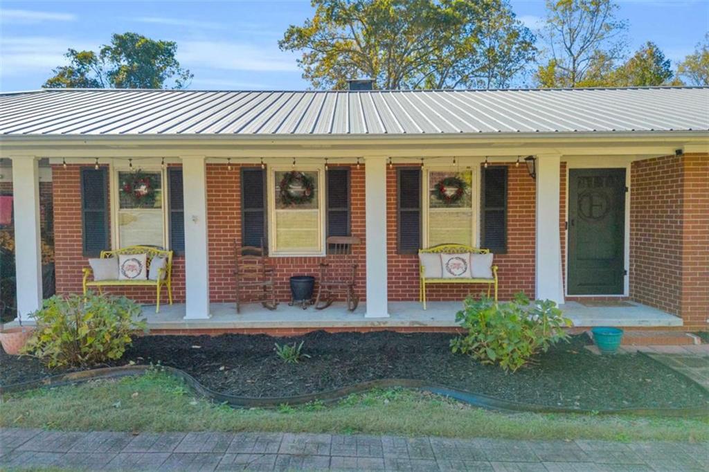 97 Williams Street Toccoa, GA 30577 - Photo 6 of 55 front view of a house with a yard