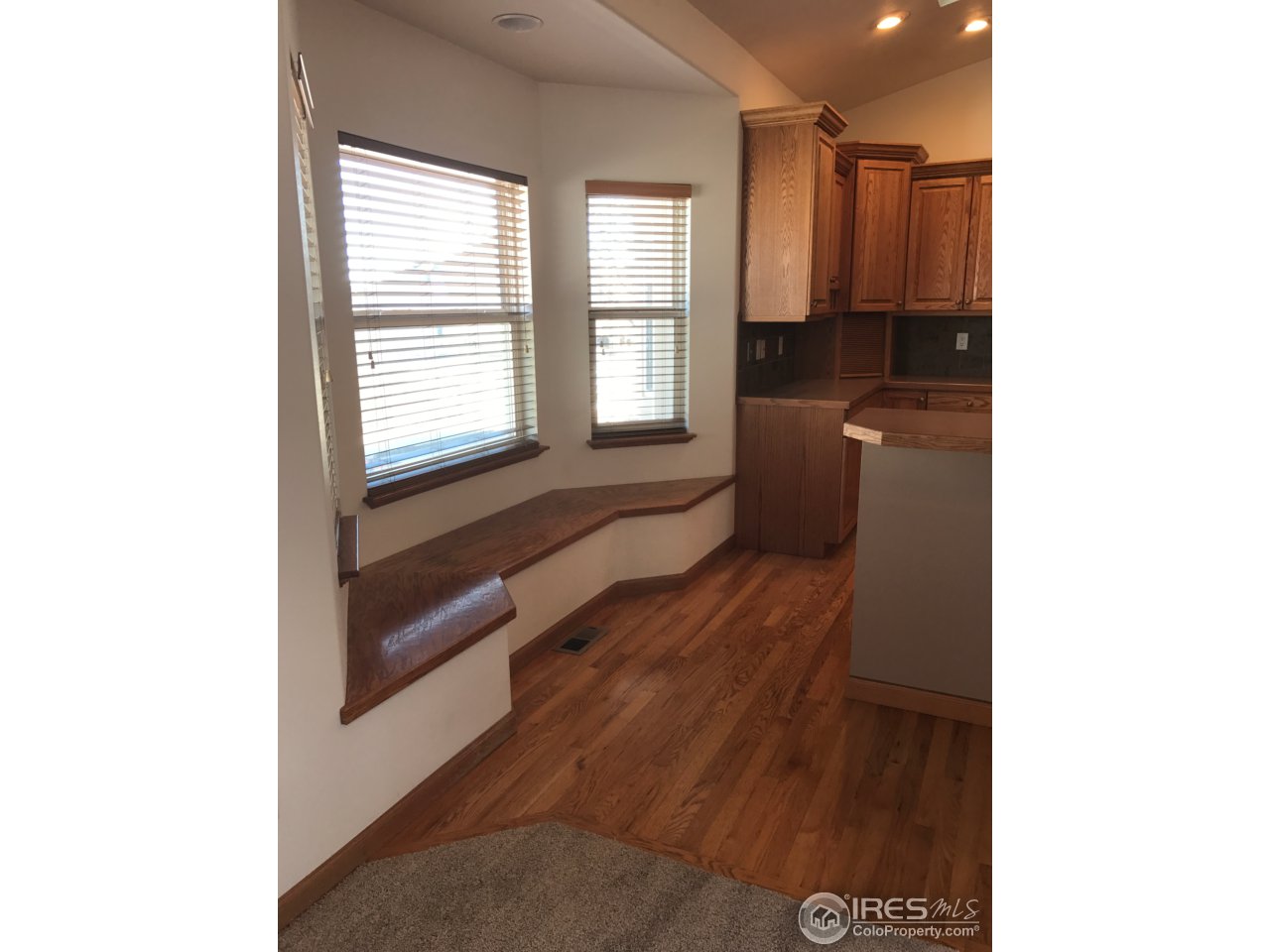 165 Ridge Road Eaton, CO 80615 - Photo 11 of 40 Built in bench for extra seating
