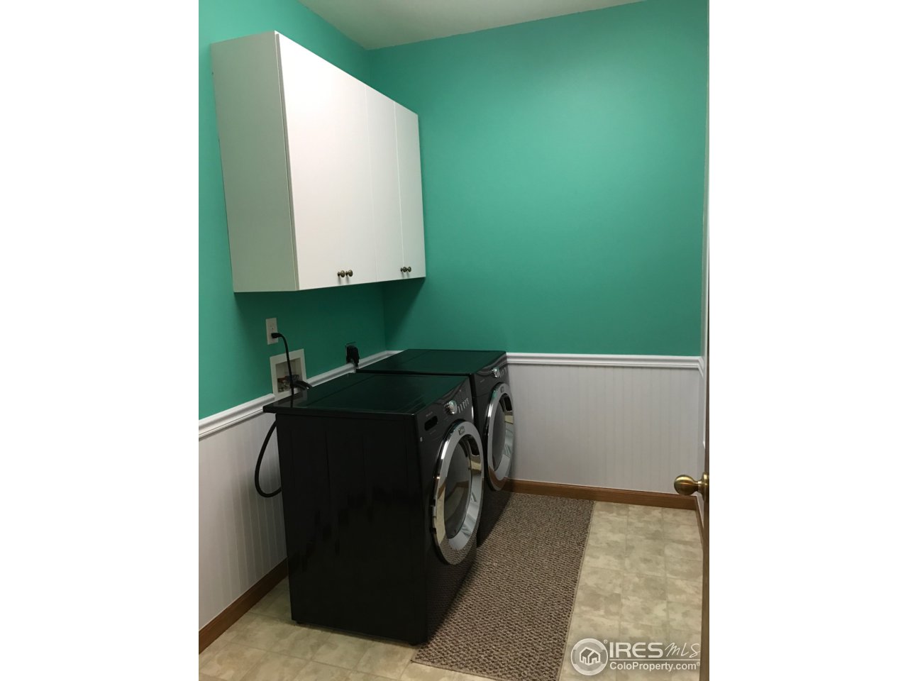 165 Ridge Road Eaton, CO 80615 - Photo 17 of 40 Large laundry room w/ handy open cabinets too