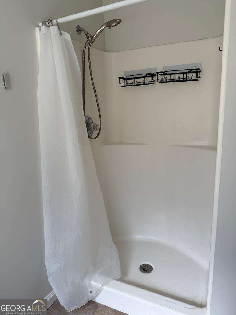 4125 Springruff Drive Valdosta, GA 31602 - Photo 13 of 22 a bathroom with a shower