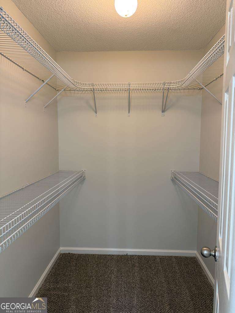 4125 Springruff Drive Valdosta, GA 31602 - Photo 14 of 22 a view of a room with racks on the wall