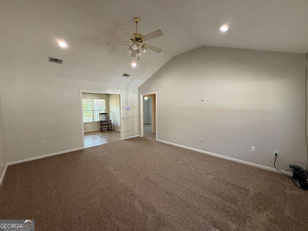4125 Springruff Drive Valdosta, GA 31602 - Photo 3 of 22 an empty room with a empty space and windows