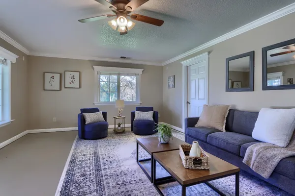 a bathroom with a sink a mirror and a shower