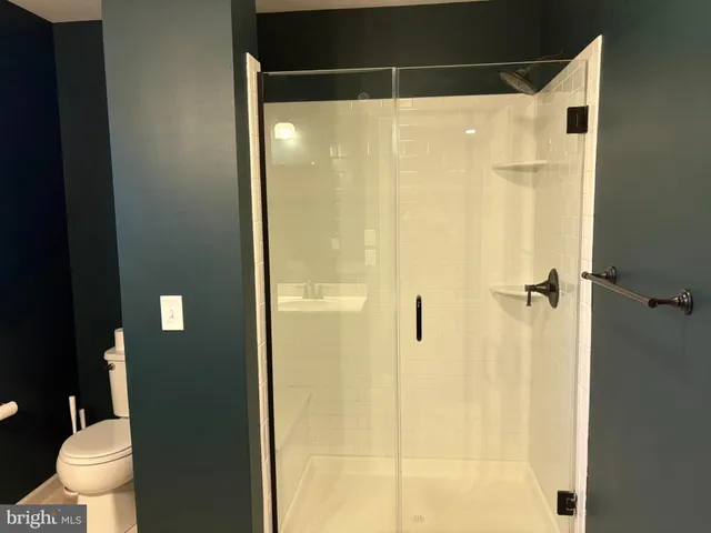 a bathroom with a sink vanity and a mirror