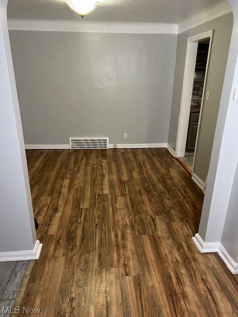 13623 Thraves Road Garfield Heights, OH 44125 - Photo 7 of 23 Spare room featuring dark hardwood / wood-style flooring