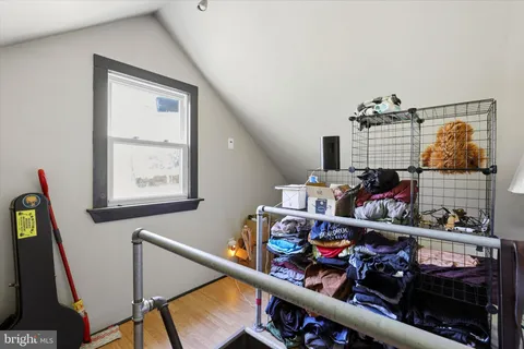 a backyard of a house with a yard and outdoor seating