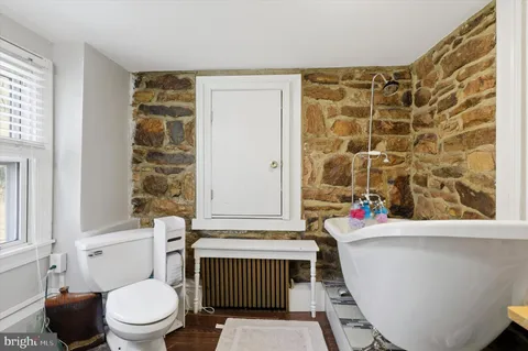 a bathroom with a sink and a toilet