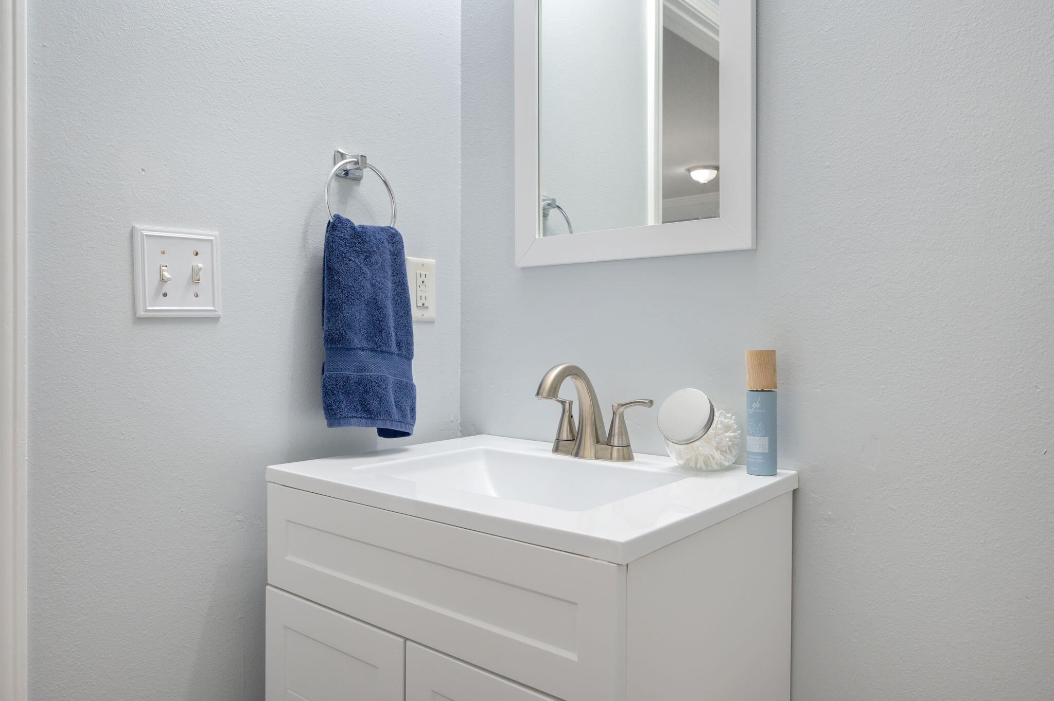 5249 Kervin Road Crestview, FL 32539 - Photo 19 of 27 a bathroom with a sink and a mirror