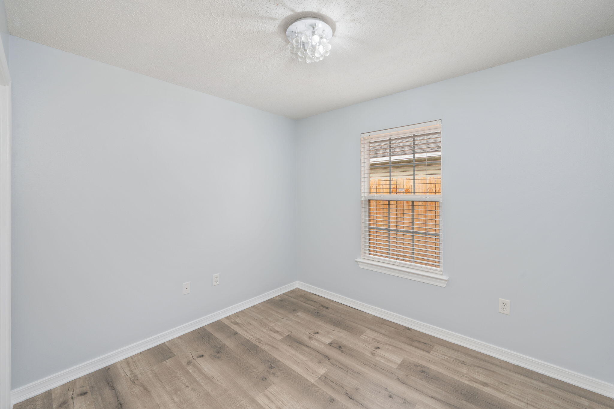 5249 Kervin Road Crestview, FL 32539 - Photo 20 of 27 an empty room with a window