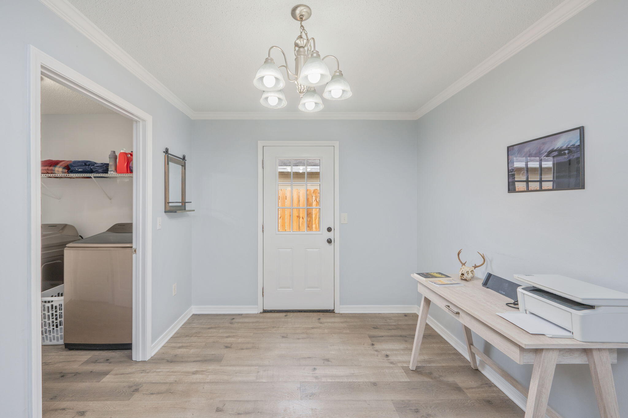 5249 Kervin Road Crestview, FL 32539 - Photo 9 of 27 a very nice looking room with a chandelier