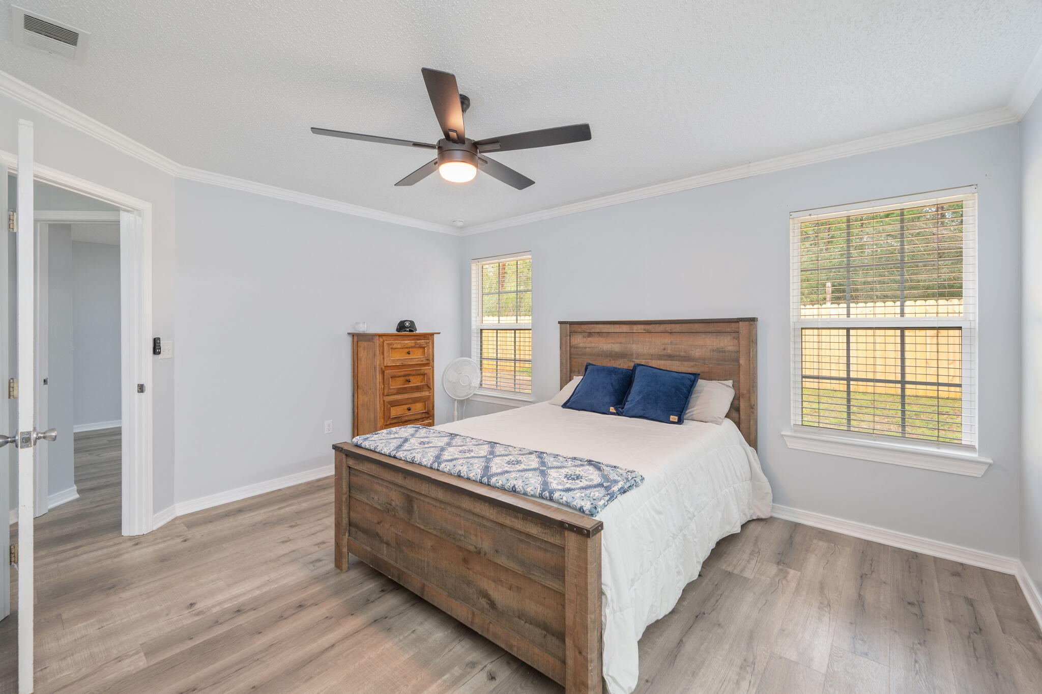 5249 Kervin Road Crestview, FL 32539 - Photo 10 of 27 a bedroom with a bed and a window