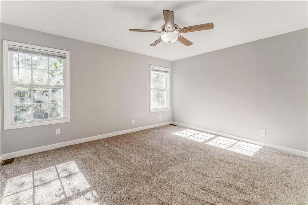 3016 Butler Creek Road Northwest Kennesaw, GA 30152 - Photo 20 of 43 a view of an empty room with a window