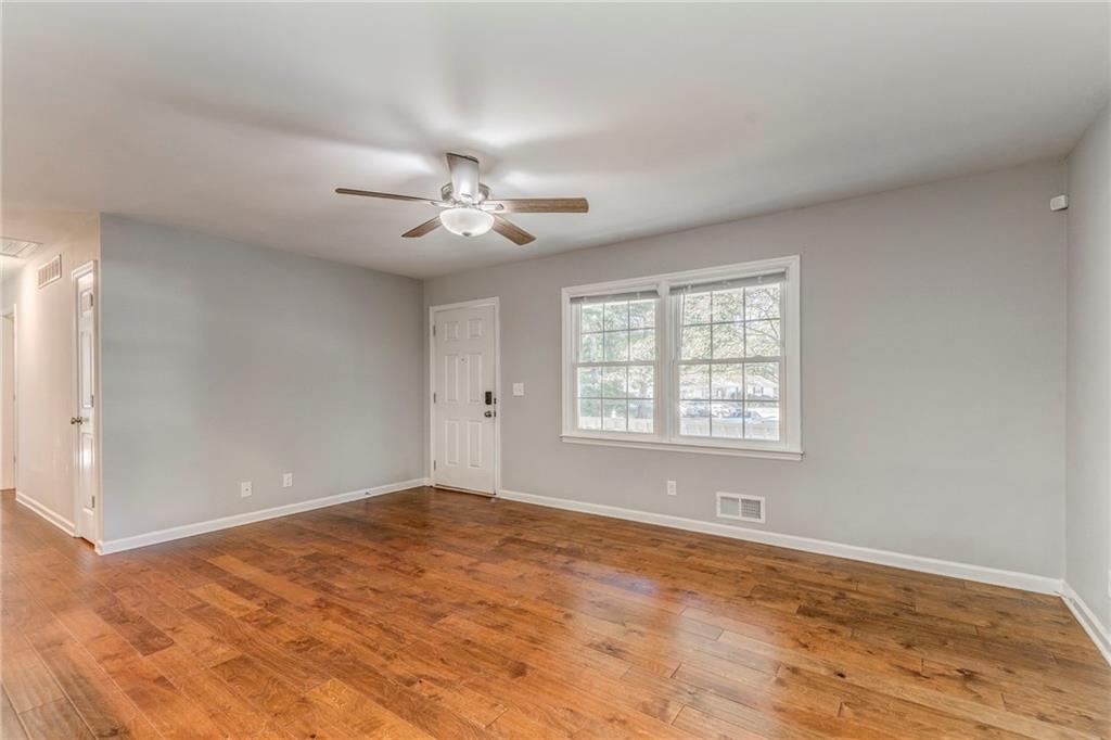 3016 Butler Creek Road Northwest Kennesaw, GA 30152 - Photo 40 of 43 a view of an empty room with a window