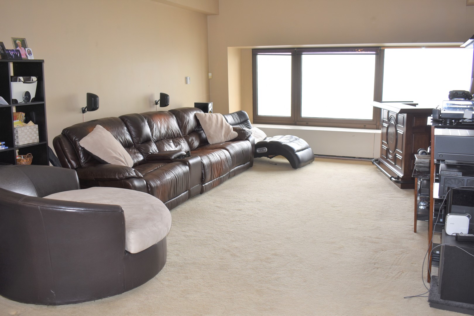 175 East Delaware Place, Unit 5501 Chicago, IL 60611 - Photo 12 of 37 a living room with furniture and a flat screen tv