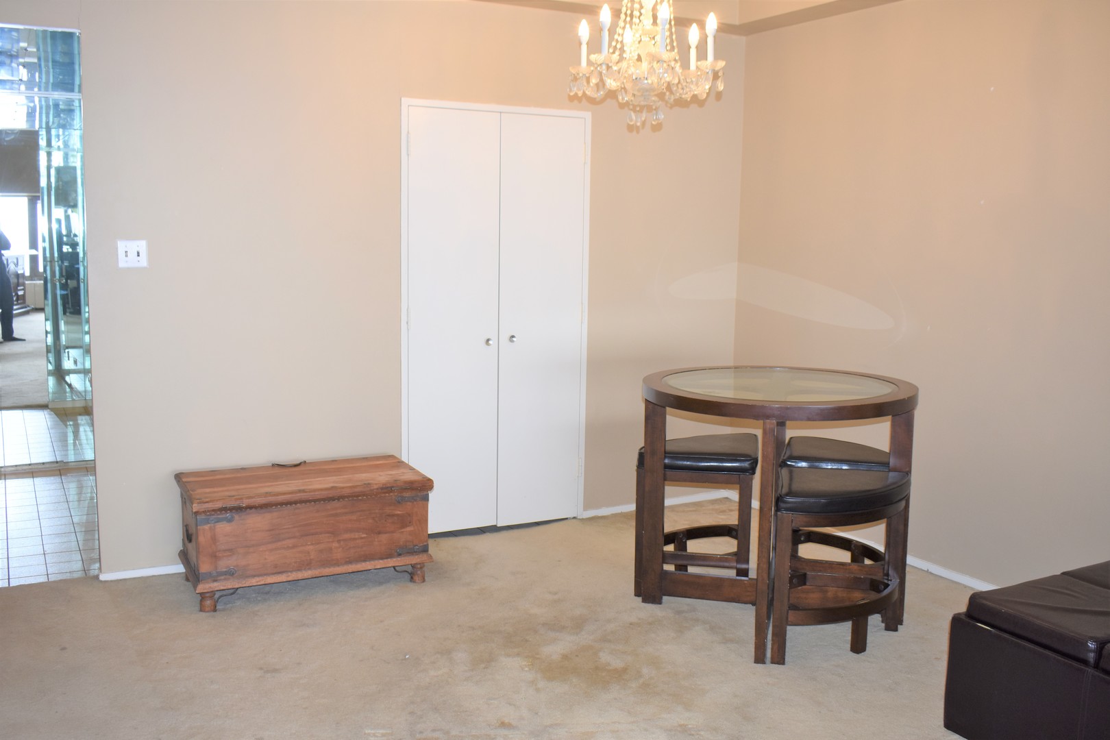175 East Delaware Place, Unit 5501 Chicago, IL 60611 - Photo 14 of 37 a room with a furniture and a chandelier