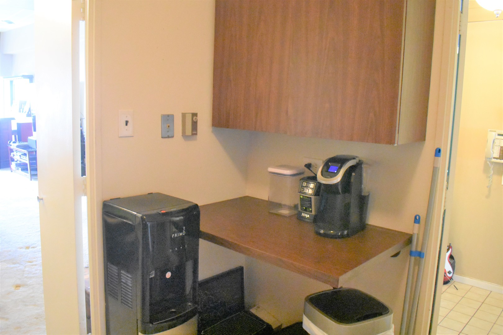 175 East Delaware Place, Unit 5501 Chicago, IL 60611 - Photo 18 of 37 a kitchen with a sink and cabinets