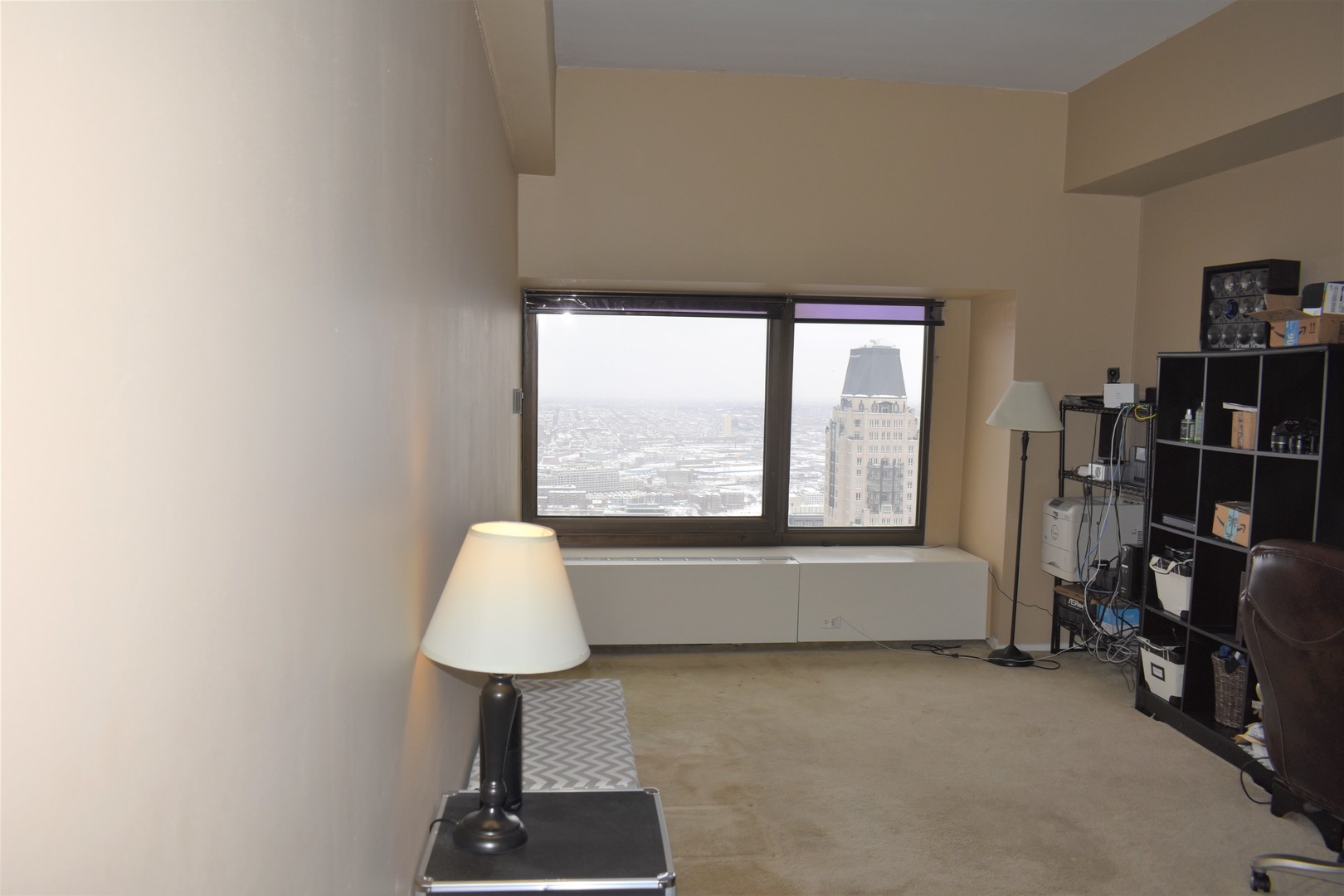 175 East Delaware Place, Unit 5501 Chicago, IL 60611 - Photo 26 of 37 a room with toys and a large window
