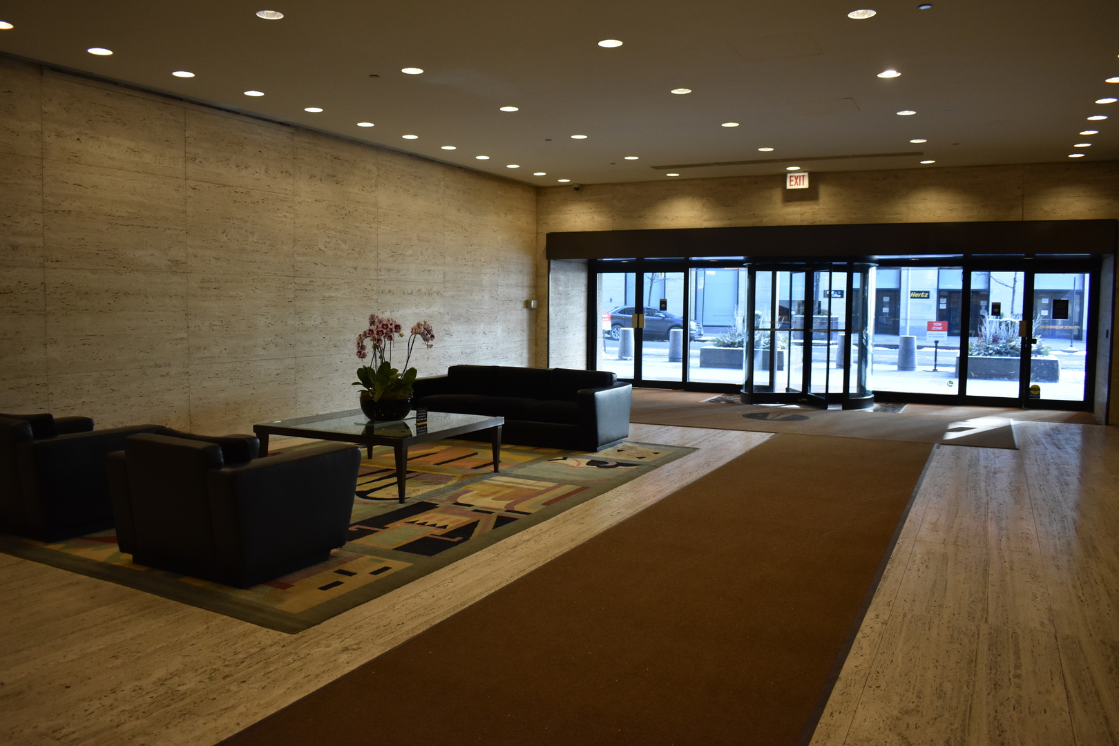 175 East Delaware Place, Unit 5501 Chicago, IL 60611 - Photo 28 of 37 a living room with furniture and a floor to ceiling window