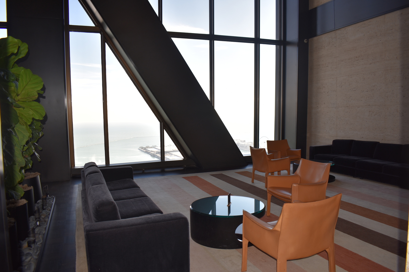 175 East Delaware Place, Unit 5501 Chicago, IL 60611 - Photo 29 of 37 a dining room with furniture and a window