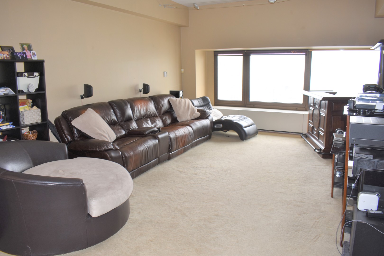 175 East Delaware Place, Unit 5501 Chicago, IL 60611 - Photo 8 of 37 a living room with furniture and a flat screen tv