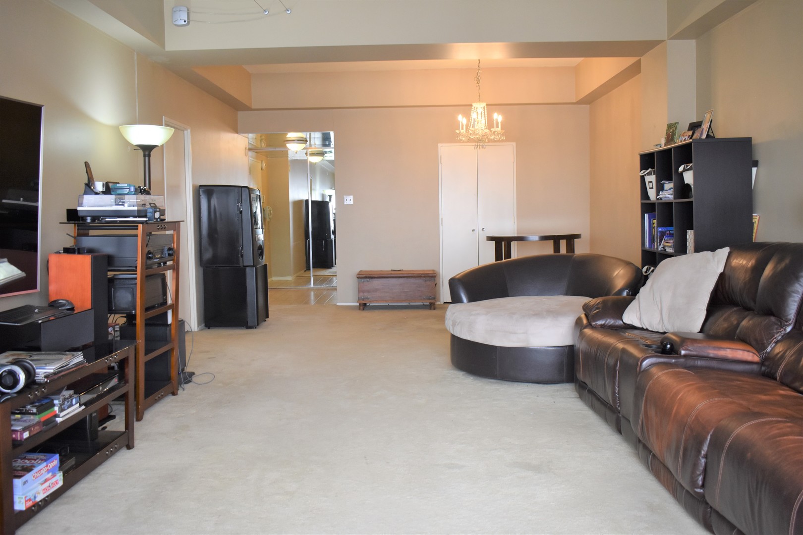 175 East Delaware Place, Unit 5501 Chicago, IL 60611 - Photo 9 of 37 a living room with furniture and a flat screen tv