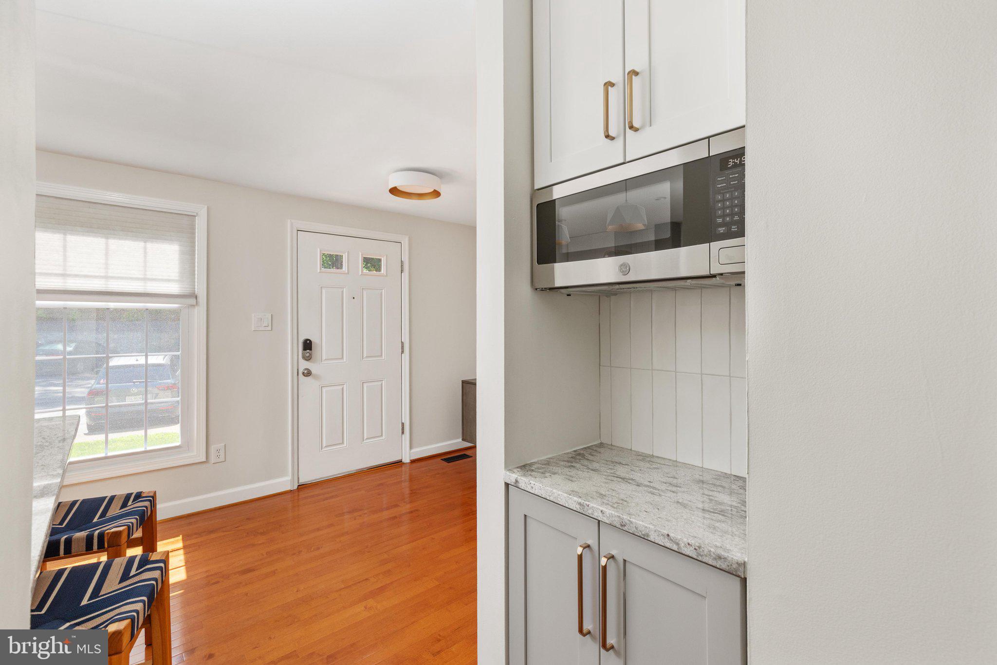 10927 Harpers Square Court Reston, VA 20191 - Photo 8 of 43 2E6A2654_10927 Harpers Square Ct - Absolute Altitu