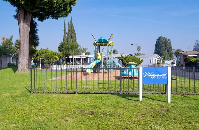 a view of a park with swings