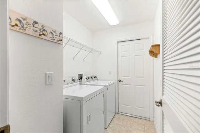 a bathroom with a sink a mirror and vanity