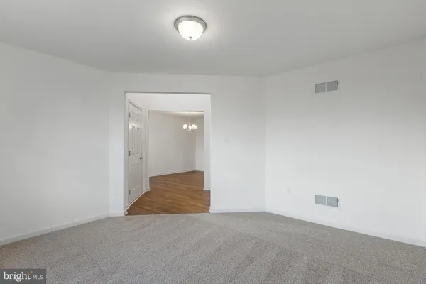 an empty room with an entryway