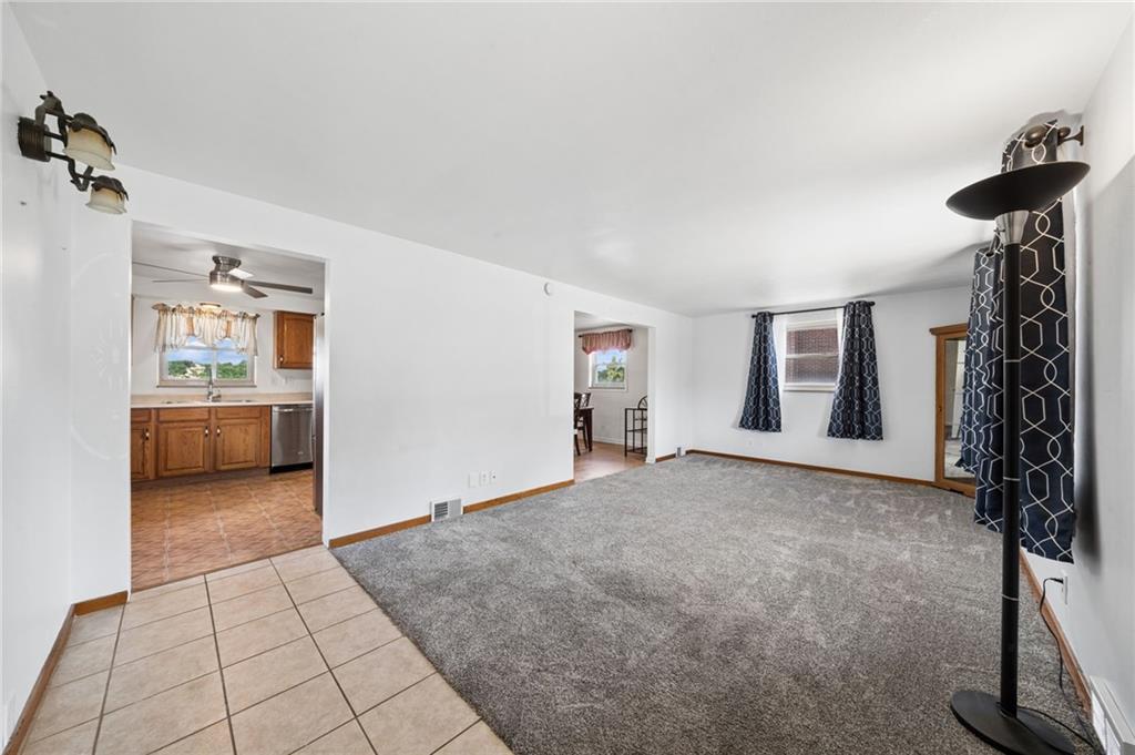 711 Jane Street Pittsburgh, PA 15239 - Photo 4 of 27 Another view showing an inviting space perfect for relaxation or entertaining guests.