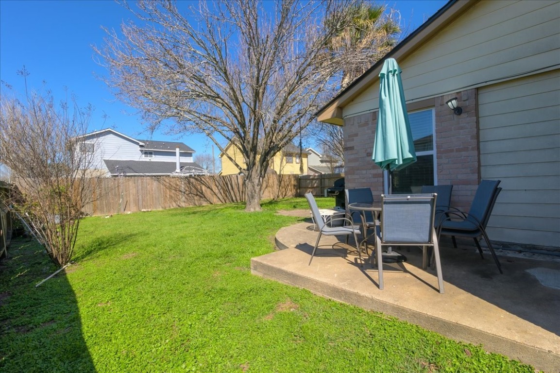 12926 Grovemill Drive Houston, TX 77045 - Photo 23 of 30 a view of a house with backyard and sitting area