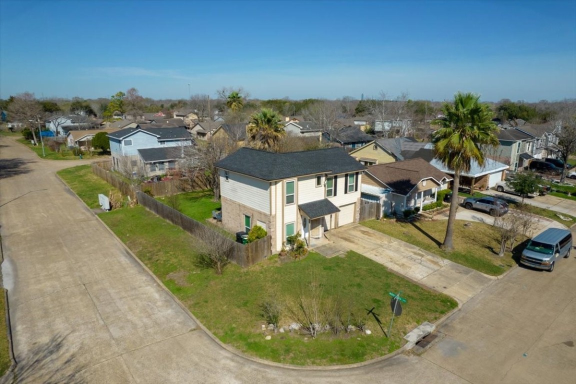 12926 Grovemill Drive Houston, TX 77045 - Photo 27 of 30 an aerial view of a house with outdoor space