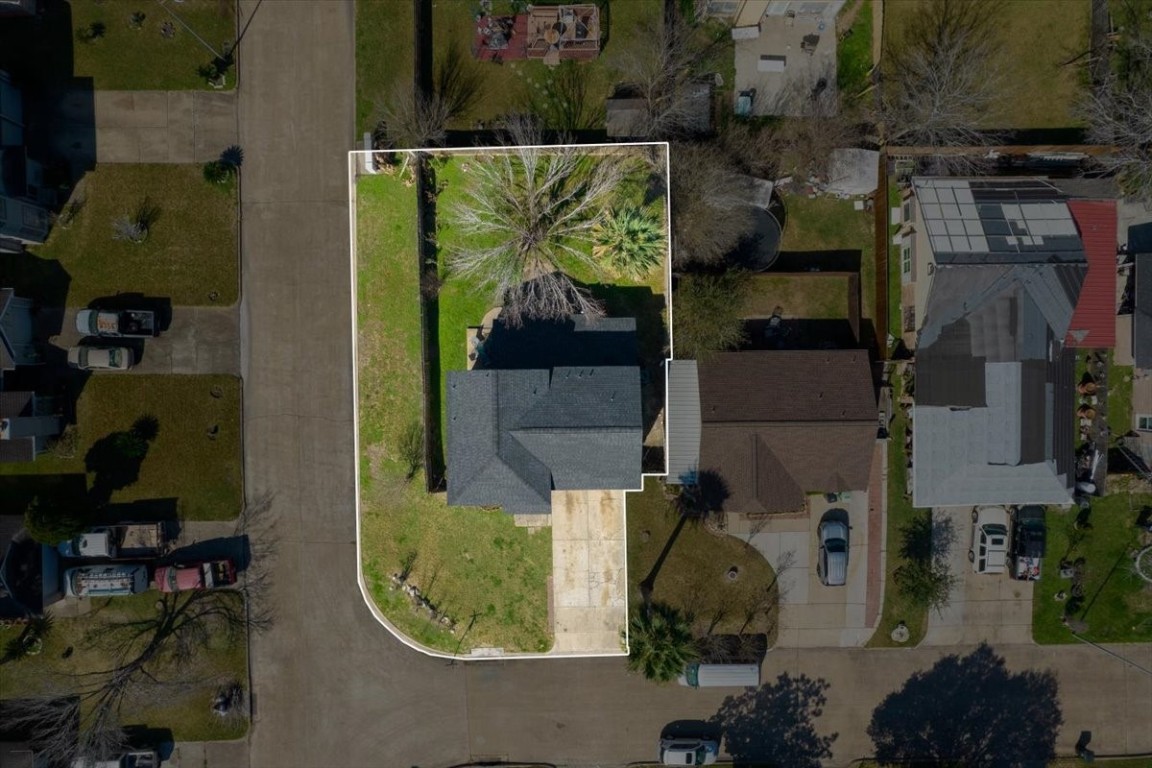 12926 Grovemill Drive Houston, TX 77045 - Photo 28 of 30 an aerial view of a house with outdoor space