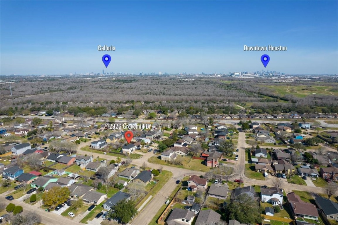 12926 Grovemill Drive Houston, TX 77045 - Photo 30 of 30 an aerial view of a water with a mountain