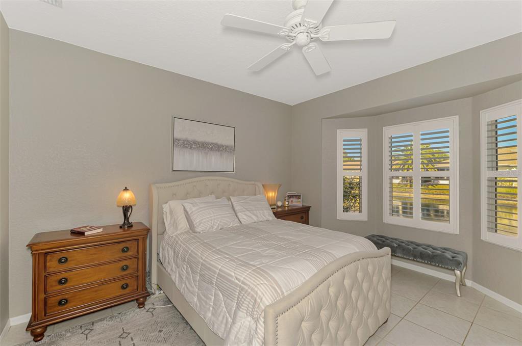1771 Fountain View Circle Venice, FL 34292 - Photo 31 of 59 a bedroom with a bed and a window