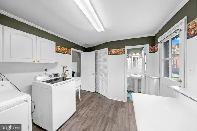 a kitchen with stainless steel appliances granite countertop a stove and a refrigerator