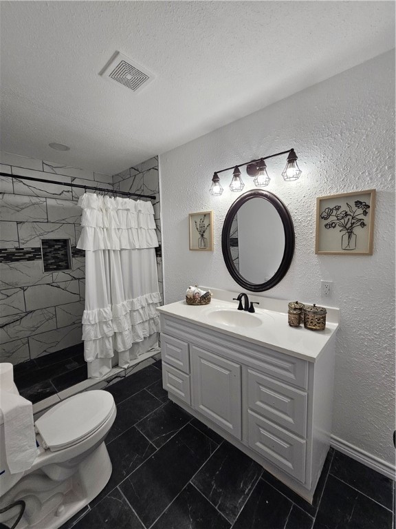 2001 1st Street Bayside, TX 78340 - Photo 14 of 26 a bathroom with a sink mirror vanity and toilet
