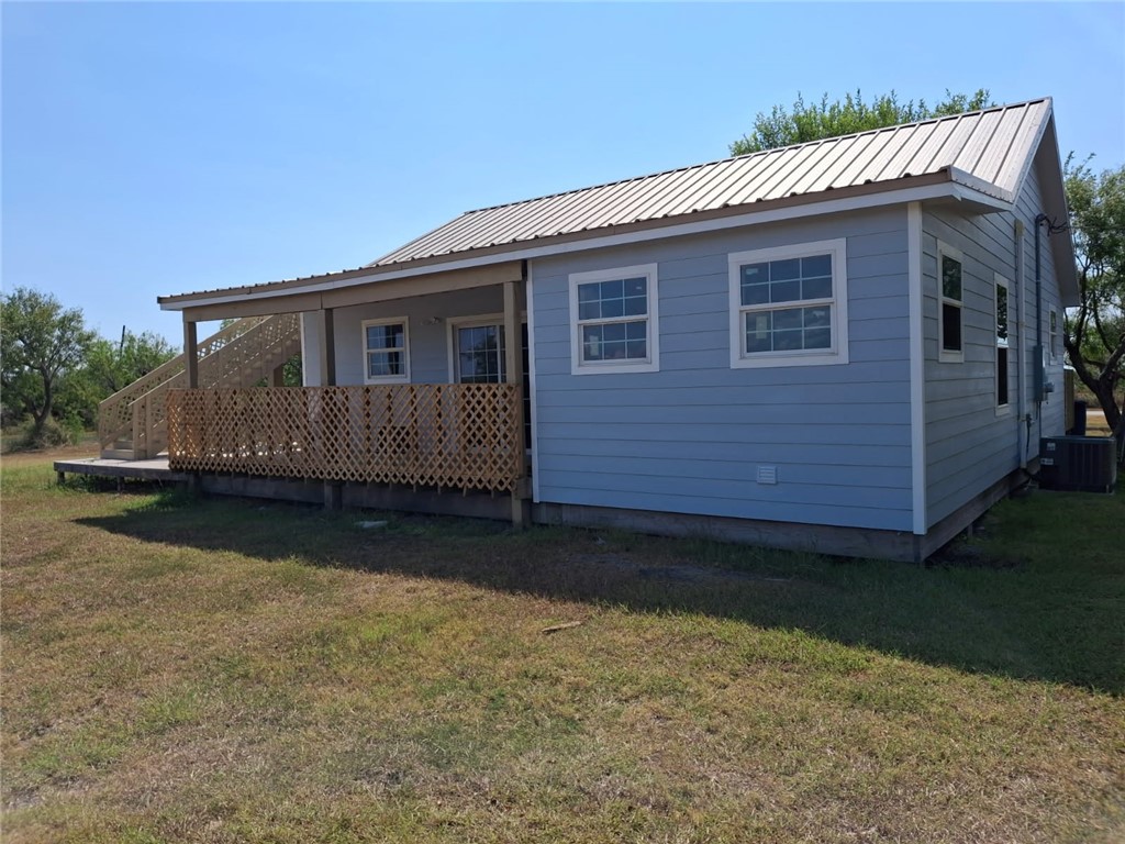 2001 1st Street Bayside, TX 78340 - Photo 21 of 26 a view of a house with a yard