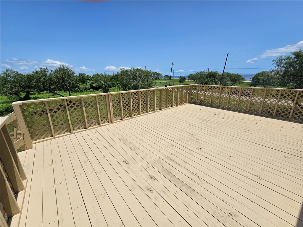 2001 1st Street Bayside, TX 78340 - Photo 24 of 26 a view of balcony with wooden floor and city view