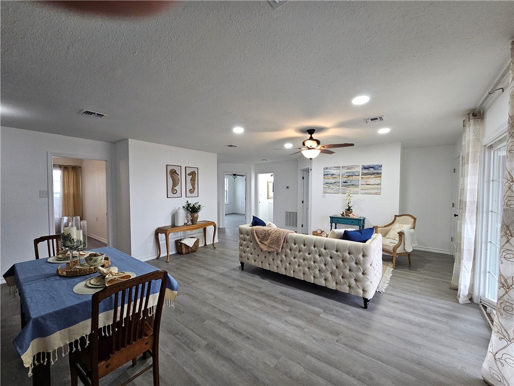2001 1st Street Bayside, TX 78340 - Photo 26 of 26 a living room with furniture and wooden floor