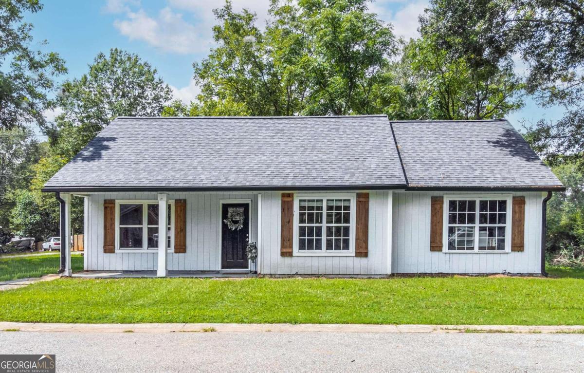 419 Maple Way Monroe, GA 30655 - Photo 1 of 1 a house view with a garden space