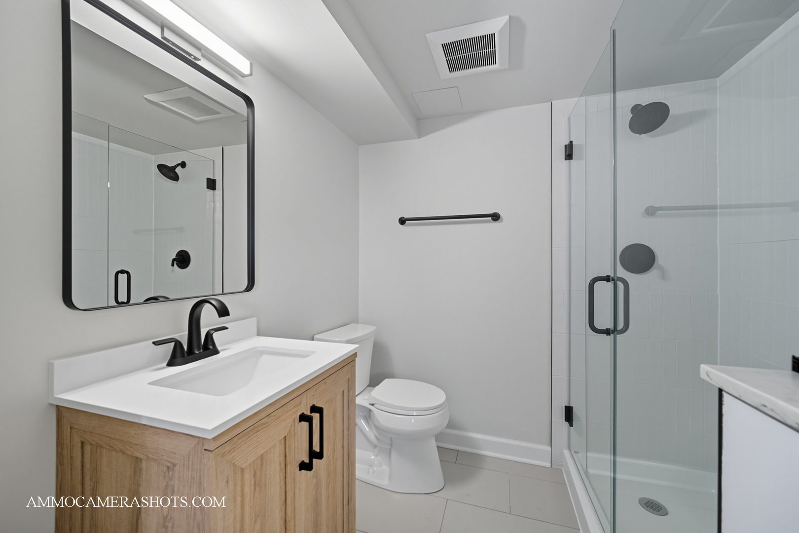 143 Ann Street, Unit 1S Clarendon Hills, IL 60514 - Photo 16 of 27 a bathroom with a sink toilet and shower