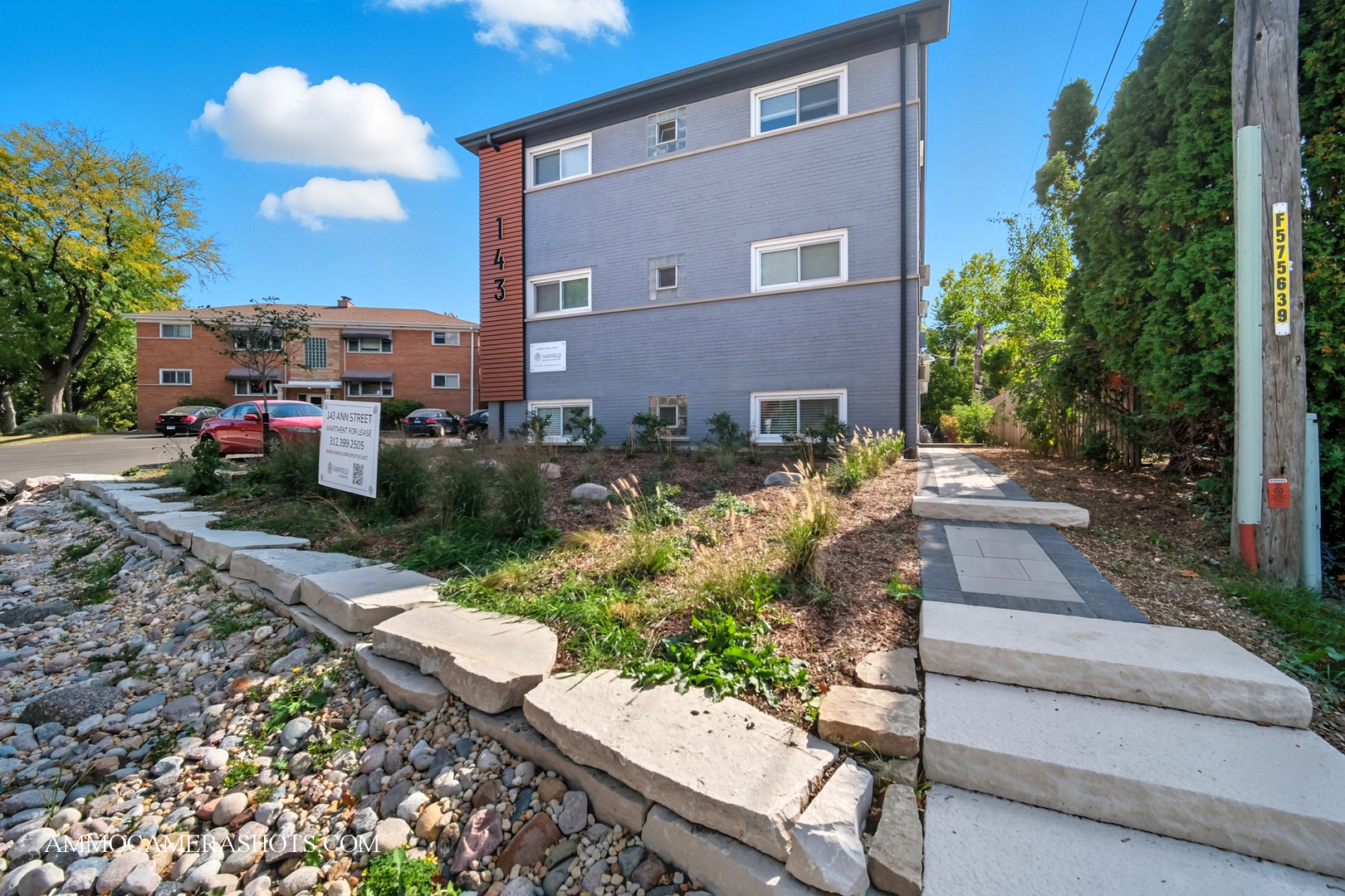 143 Ann Street, Unit 1S Clarendon Hills, IL 60514 - Photo 21 of 27 a front view of a house with garden