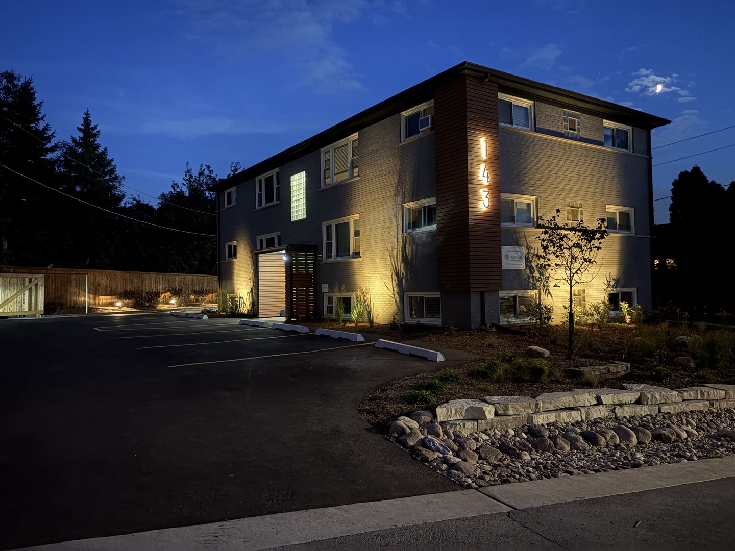 143 Ann Street, Unit 1S Clarendon Hills, IL 60514 - Photo 26 of 27 a front view of a house with a yard