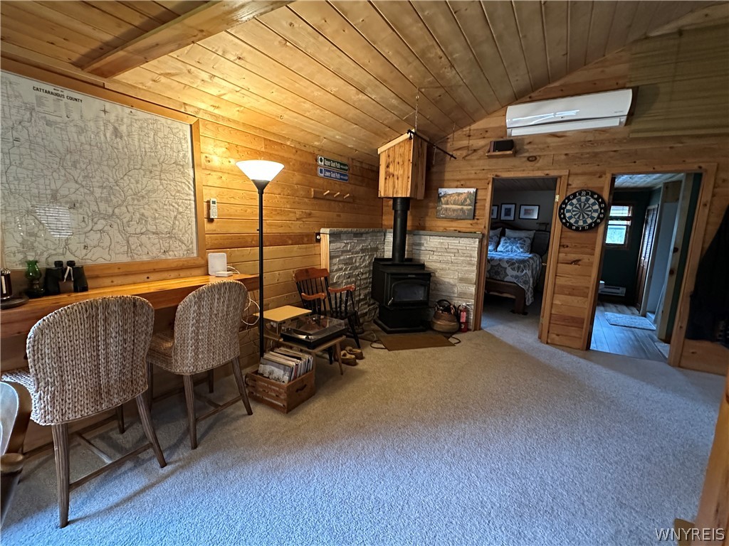 4098 Barker Run Road Great Valley, NY 14741 - Photo 6 of 25 The black chair next to the wood stove is excluded